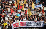 Protesters chant slogans and hold a banner reading 'No to Censorship, Freedom for News' during a rally against what they described as growing pressure on journalists including arrests and media shutdowns, in Ankara, Turkey, on October 24, 2026. (ADEM ALTAN/AFP)