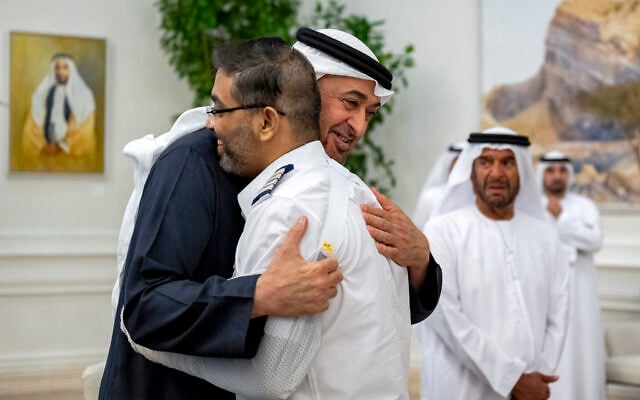 This handout picture provided by the UAE Presidential Court shows UAE President Sheikh Mohamed bin Zayed Al-Nahyan embracing Flydubai pilot Smit Machchhar, during a reception for him and other crew members of Flight 1073 in Abu Dhabi on October 27, 2026. (Abdulla AL-NEYADI/UAE PRESIDENTIAL COURT/AFP) This handout picture provided by the UAE Presidential Court shows UAE President Sheikh Mohamed bin Zayed Al-Nahyan embracing Flydubai pilot Smit Machchhar, during a reception for him and other crew members of Flight 1073 in Abu Dhabi on October 27, 2026. (Abdulla AL-NEYADI/UAE PRESIDENTIAL COURT/AFP)