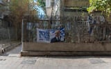 A ripped poster of Prime Minister Benjamin Netanyahu is seen in south Tel Aviv on October 28, 2026, a day after Israel’s general election. (Ilia Yefimovich/AFP)