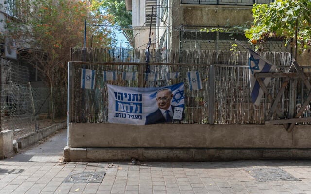 A ripped poster of Prime Minister Benjamin Netanyahu is seen in south Tel Aviv on October 28, 2026, a day after Israel’s election. (Ilia YEFIMOVICH/AFP)