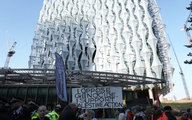 Pro-Palestinian, anti-Israel activists protest in support of Palestine Action, which the UK government has proscribed as a terror group, outside the US Embassy in London on October 31, 2026. (Carlos Jasso/AFP)