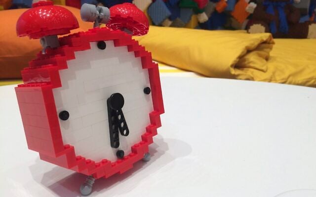 An illustrative photo of an alarm clock made from Lego bricks, in Billund, Denmark, September 2017. (AP Photo/James Brooks)
