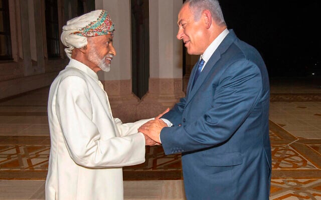 In this October 26, 2018 file photo, released by Oman News Agency, Oman’s Sultan Qaboos, left, receives Israeli Prime Minister Benjamin Netanyahu in Muscat, Oman. (Oman News Agency via AP)