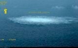 In this picture provided by Swedish Coast Guard, the gas leak in the Baltic Sea from Nord Stream photographed from the Coast Guard’s aircraft on September 27, 2022. (Swedish Coast Guard via AP)