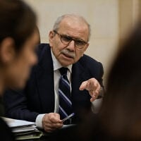 Lebanese Prime Minister Nawaf Salam meets with journalists working for foreign media and news agencies at the government palace in Beirut, December 3, 2025. (AP Photo/Bilal Hussein)