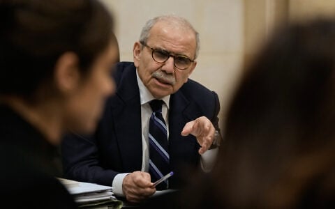 Lebanese Prime Minister Nawaf Salam meets with journalists working for foreign media and news agencies at the government palace in Beirut, December 3, 2025. (AP Photo/Bilal Hussein)
