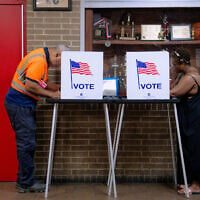 People vote in the primary election at Northwestern High School in Detroit, August 4, 2026. (Nic Antaya/AP)