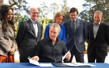 California Gov. Gavin Newsom prepares to sign conservations bills during a visit to the California Academy of Sciences in San Francisco, September 29, 2026. (AP Photo/Rich Pedroncelli)