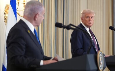 US President Donald Trump, right, listens during a news conference with Israeli Prime Minister Benjamin Netanyahu in the State Dining Room of the White House, September 29, 2025, in Washington. (AP Photo/Evan Vucci) US President Donald Trump, right, listens during a news conference with Israeli Prime Minister Benjamin Netanyahu in the State Dining Room of the White House, September 29, 2025, in Washington. (AP Photo/Evan Vucci)