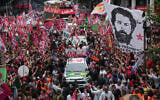 Brazilian President Luiz Inacio Lula da Silva, who is running for reelection, center, accompanied by Senate candidates Benedita da Silva, right, and Pedro Paulo, attends a campaign rally in Rio de Janeiro, Brazil, October 2, 2026. (AP Photo/Silvia Izquierdo)