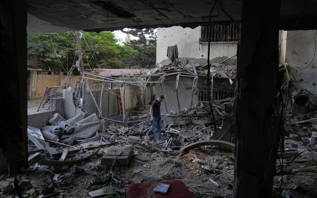 Palestinians inspect the site of an early morning Israeli airstrike in Gaza City, in the Strip's north, on October 3, 2026. (AP Photo/Jehad Alshrafi) Palestinians inspect the site of an early morning Israeli airstrike in Gaza City, in the Strip's north, on October 3, 2026. (AP Photo/Jehad Alshrafi)