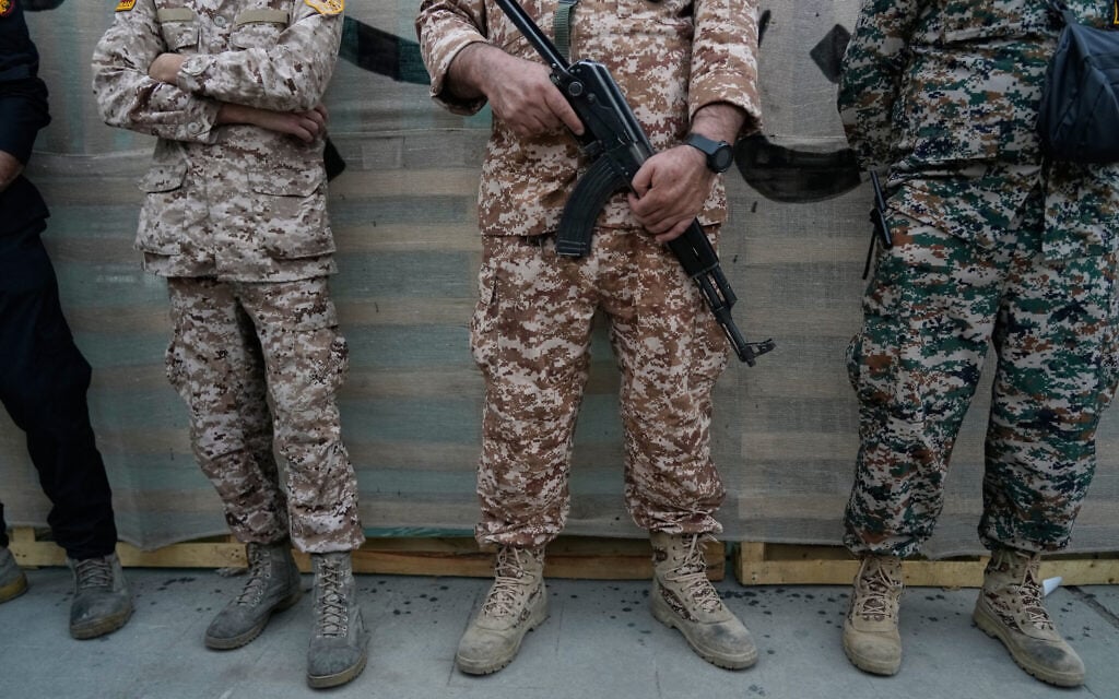 Men affiliated with the Islamic Revolutionary Guard Corps stand during the opening ceremony of one of the military training centers for volunteers being set up throughout squares in downtown Tehran, Iran, October 3, 2026. (AP Photo/Vahid Salemi) Men affiliated with the Islamic Revolutionary Guard Corps stand during the opening ceremony of one of the military training centers for volunteers being set up throughout squares in downtown Tehran, Iran, October 3, 2026. (AP Photo/Vahid Salemi)