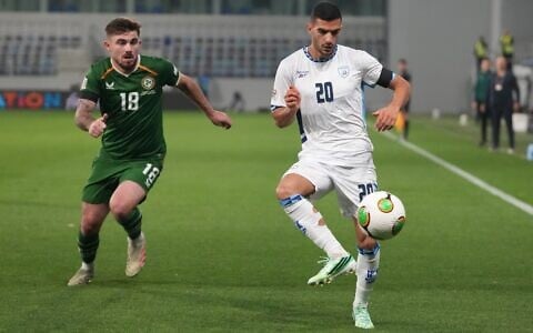 Israel’s Liel Abada passes the ball by Ireland’s Owen Elding during the UEFA Nations League soccer match between the Republic of Ireland and Israel in Backa Topola, Serbia, October 4, 2026. (AP/Darko Vojinovic)
