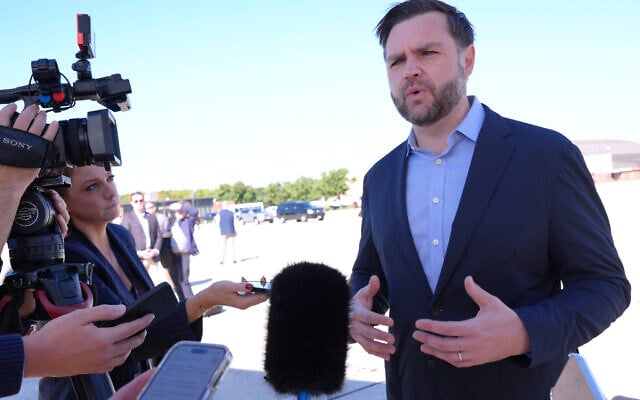 US Vice President JD Vance speaks to reporters before boarding Air Force Two, at Joint Base Andrews, Md., October 5, 2026, en route to Alaska. (AP Photo/Jacquelyn Martin, pool) US Vice President JD Vance speaks to reporters before boarding Air Force Two, at Joint Base Andrews, Md., October 5, 2026, en route to Alaska. (AP Photo/Jacquelyn Martin, pool)