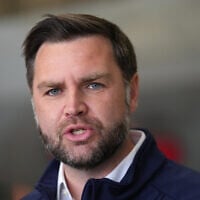 US Vice President JD Vance speaks to reporters before boarding Air Force Two, at Elmendorf Air Force Base, October 6, 2026, in Anchorage, Alaska. (AP Photo/Jacquelyn Martin, Pool)