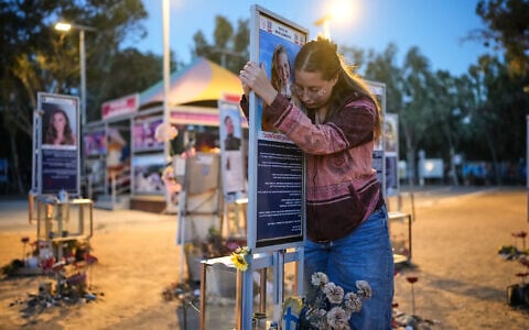 Raz Zarfati, sister of Ron Zarfati who was killed in the October 7, 2023, Hamas attack on Israel, attend a memorial marking the third anniversary of the attack at the Nova music festival site near Kibbutz Reim, southern Israel, October 7, 2026. (AP Photo/Ohad Zwigenberg)