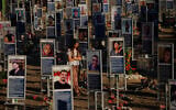 People mark the third anniversary of the October 7, 2023, Hamas attack on Israel at the site of the Nova music festival, where hundreds of revelers were killed and abducted, near Kibbutz Re'im, southern Israel, October 7, 2026. (AP Photo/Ohad Zwigenberg)