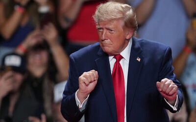 US President Donald Trump dances at a campaign rally at the Freeman Coliseum in San Antonio, October 7, 2026. (AP/Eric Gay)