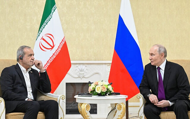 Russian President Vladimir Putin, right, speaks to Iranian President Masoud Pezeshkian during their meeting on the sidelines of the Commonwealth of Independent States (CIS) summit in Türkmenbaşy, Turkmenistan, October 8, 2026. (Sergei Bobylev/Sputnik, Kremlin Pool Photo via AP) Russian President Vladimir Putin, right, speaks to Iranian President Masoud Pezeshkian during their meeting on the sidelines of the Commonwealth of Independent States (CIS) summit in Türkmenbaşy, Turkmenistan, October 8, 2026. (Sergei Bobylev/Sputnik, Kremlin Pool Photo via AP)
