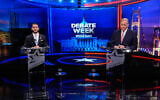 Democratic nominee for US Senate Abdul El-Sayed, left, appears with Republican nominee for US Senate Mike Rogers during a televised debate at WOOD-TV, on October 8, 2026, in Grand Rapids, Mich. (AP Photo/Paul Sancya, Pool)