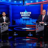 Democratic nominee for US Senate Abdul El-Sayed, left, appears with Republican nominee for US Senate Mike Rogers during a televised debate at WOOD-TV, on October 8, 2026, in Grand Rapids, Mich. (AP Photo/Paul Sancya, Pool)