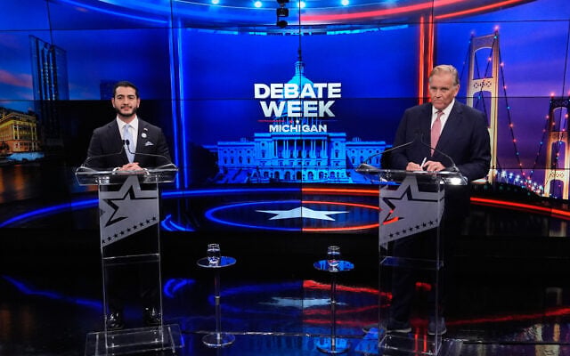 Democratic nominee for US Senate Abdul El-Sayed, left, appears with Republican nominee for US Senate Mike Rogers during a televised debate at WOOD-TV, on October 8, 2026, in Grand Rapids, Mich. (AP Photo/Paul Sancya, Pool)