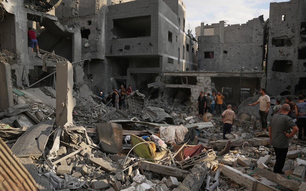 Palestinians inspect a building destroyed in an Israeli airstrike late on Thursday in Khan Younis, southern Gaza Strip, October 9, 2026. (AP Photo/Abdel Kareem Hana) Palestinians inspect a building destroyed in an Israeli airstrike late on Thursday in Khan Younis, southern Gaza Strip, October 9, 2026. (AP Photo/Abdel Kareem Hana)