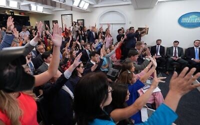Reporters raise hands to ask a question in the James Brady Press Briefing Room at the White House, September 3, 2026, in Washington. (AP Photo/Alex Brandon)