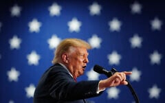 US President Donald Trump speaks at a campaign rally at the Oncenter, October 9, 2026, in Syracuse, New York. (AP Photo/Julia Demaree Nikhinson)