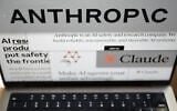 Pages from the Anthropic website and the company’s logos are displayed on a computer screen in New York, on February 26, 2026. (AP Photo/Patrick Sison)