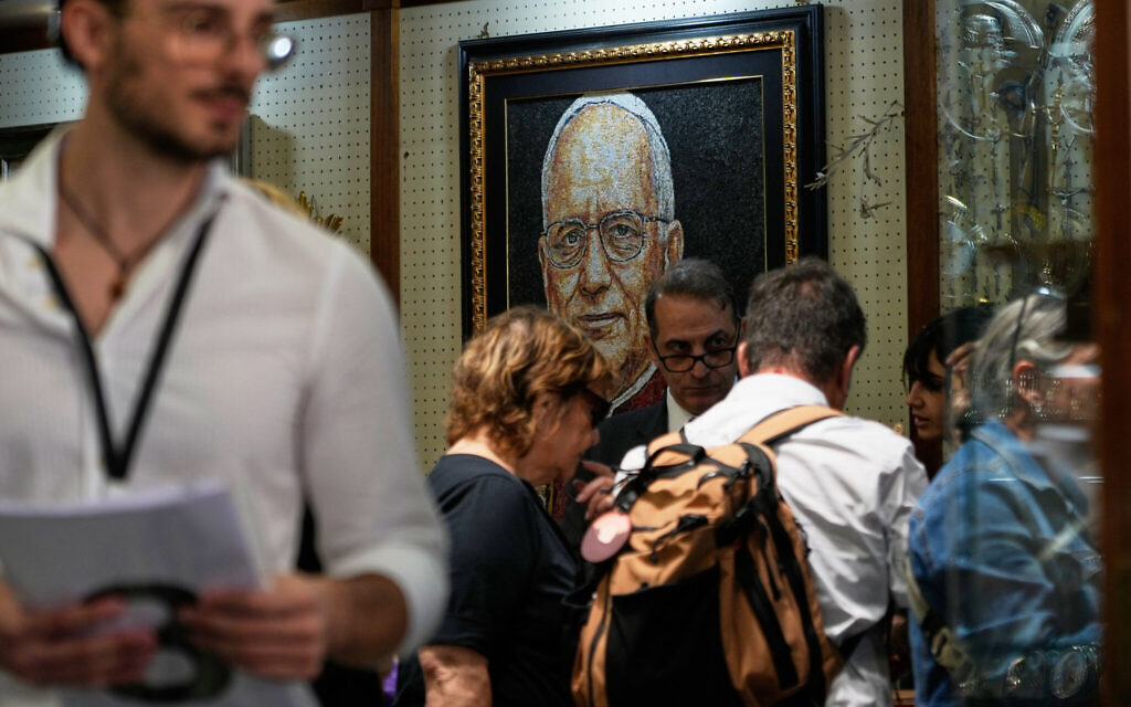 A mosaic of Pope Leo XIV is displayed inside a shop selling religious items near St. Peter’s Square, in Rome, October 12, 2026. (AP Photo/Gregorio Borgia) A mosaic of Pope Leo XIV is displayed inside a shop selling religious items near St. Peter’s Square, in Rome, October 12, 2026. (AP Photo/Gregorio Borgia)