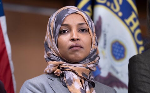 US Rep. Ilhan Omar takes questions during a news conference at the Capitol in Washington, January 13, 2026. (AP Photo/J. Scott Applewhite)