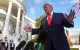 US President Donald Trump speaks with reporters before walking to board Marine One on the South Lawn of the White House, October 12, 2026, in Washington. (AP/Julia Demaree Nikhinson)