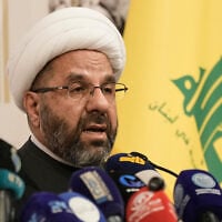 Ali Daamoush, head of Hezbollah’s Executive Council, speaks during a news conference in Beirut, Lebanon, October 13, 2026. (AP Photo/Bilal Hussein)