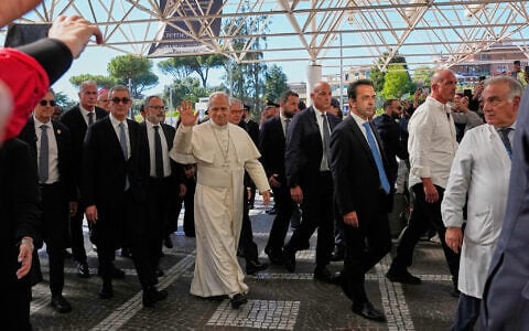 Pope Leo XIV arrives at the Agostino Gemelli Polyclinic in Rome, October 13, 2026, where he was expected to be operated on to remove a lung nodule. (AP Photo/Alessandra Tarantino)