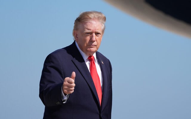 US President Donald Trump walks to board Air Force One, October 13, 2026, at Joint Base Andrews, Md. (AP Photo/Alex Brandon) US President Donald Trump walks to board Air Force One, October 13, 2026, at Joint Base Andrews, Md. (AP Photo/Alex Brandon)