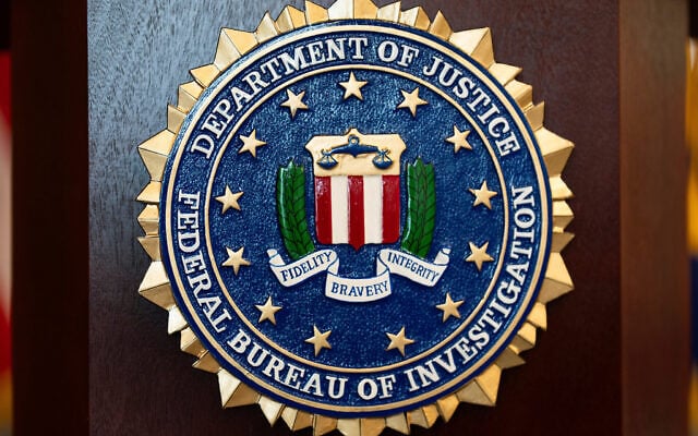 An FBI seal is displayed on a podium before a news conference at the field office in Portland, Oregon, January 16, 2025. (AP Photo/Jenny Kane) An FBI seal is displayed on a podium before a news conference at the field office in Portland, Oregon, January 16, 2025. (AP Photo/Jenny Kane)