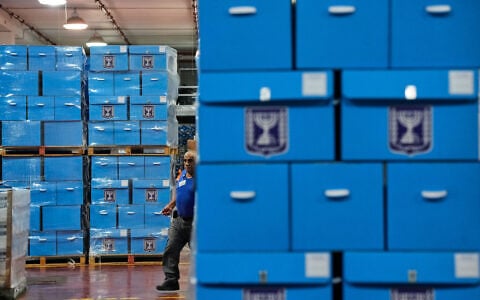Ballot boxes are prepared for Israel’s upcoming general election at the Central Elections Committee’s logistics center near Shoham, October 14, 2026. (AP Photo/Ohad Zwigenberg)