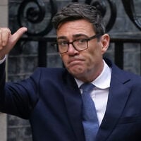Britain’s Prime Minister Andy Burnham waves goodbye to Ukraine’s President Volodymyr Zelensky after their meeting at 10 Downing Street in London, October 14, 2026. (AP Photo/Alberto Pezzali)