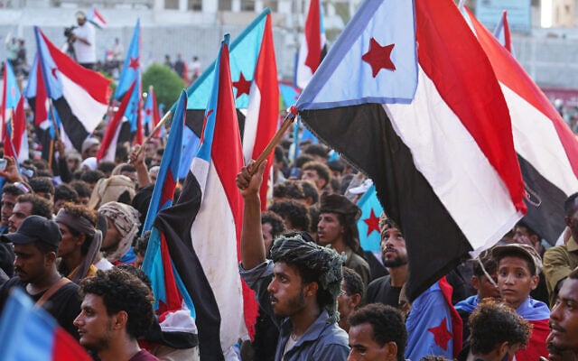 Supporters of the Southern Transitional Council (STC) hold South Yemen flags during a rally to celebrate the 63rd anniversary of the October 14 Revolution against British colonial rule and respond to calls for mobilization against the Houthi rebels in Aden, Yemen, October 14, 2026. (AP Photo/Abdulnasser Alseddik) Supporters of the Southern Transitional Council (STC) hold South Yemen flags during a rally to celebrate the 63rd anniversary of the October 14 Revolution against British colonial rule and respond to calls for mobilization against the Houthi rebels in Aden, Yemen, October 14, 2026. (AP Photo/Abdulnasser Alseddik)