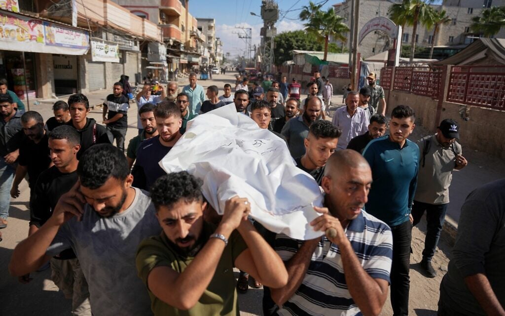 Palestinians carry the body of 14-year-old Mohammed Abu Hammad, who was killed in an Israeli strike, during his funeral at Al-Aqsa Hospital in Deir al-Balah, in the central Gaza Strip, October 17, 2026. (AP Photo/Abdel Kareem Hana) Palestinians carry the body of 14-year-old Mohammed Abu Hammad, who was killed in an Israeli strike, during his funeral at Al-Aqsa Hospital in Deir al-Balah, in the central Gaza Strip, October 17, 2026. (AP Photo/Abdel Kareem Hana)