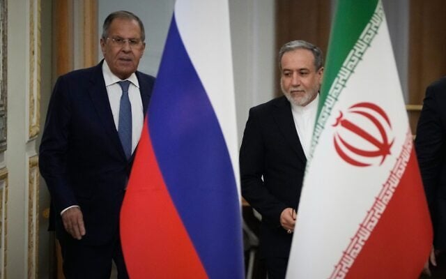 Iranian Foreign Minister Abbas Araghchi, right, and Russian Foreign Minister Sergey Lavrov arrive for a news conference after their meeting at Iran’s Foreign Ministry in Tehran, Iran, October 19, 2026. (Vahid Salemi/AP)