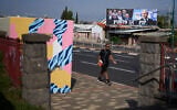 An election campaign billboard featuring Prime Minister Benjamin Netanyahu, leader of the Likud party, and other politicians hangs in Kiryat Shmona, Israel’s largest northern city, near Lebanon’s border, ahead of the country’s general election, October 13, 2026. (AP Photo/Ariel Schalit)