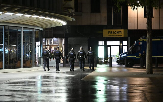 Policemen patrol during an overnight curfew in Paris, October 20, 2026. (AP Photo/Emma Da Silva) Policemen patrol during an overnight curfew in Paris, October 20, 2026. (AP Photo/Emma Da Silva)