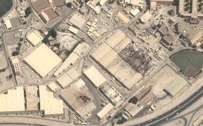 This satellite image taken over Naval Support Activity Bahrain on July 23, 2026, displaying extensive damage to the satellite communications system and warehouses. (© Airbus DS 2026 via AP)