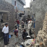 Residents inspect debris of their homes after a missile strike in Seina, Taiz, Yemen, October 20, 2026. (AP Photo/Marzouq Al Jabri)
