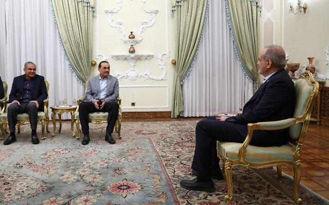 In this photo released by the Iranian Presidency Office, President Masoud Pezeshkian, right, meets Pakistan’s Army Chief Field Marshal Gen. Asim Munir, center, and Pakistan’s Interior Minister Mohsin Naqvi in Tehran, Iran, October 20, 2026. (Iranian Presidency Office via AP)
