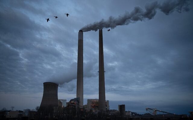 The coal-fired Mountaineer Power Plant, near New Haven, West Virginia, operates across the Ohio River from the Lock 24 RV Park and Campground in Racine, Ohio, March 13, 2026. (AP Photo/Carolyn Kaster) The coal-fired Mountaineer Power Plant, near New Haven, West Virginia, operates across the Ohio River from the Lock 24 RV Park and Campground in Racine, Ohio, March 13, 2026. (AP Photo/Carolyn Kaster)