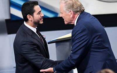 US Senate candidates Democrat Abdul El-Sayed, left, and Republican Mike Rogers shake hands after the debate on October 21, 2026, at WXYZ Channel 7 in Southfield, Mich. (Robin Buckson/Detroit News via AP, Pool) US Senate candidates Democrat Abdul El-Sayed, left, and Republican Mike Rogers shake hands after the debate on October 21, 2026, at WXYZ Channel 7 in Southfield, Mich. (Robin Buckson/Detroit News via AP, Pool)