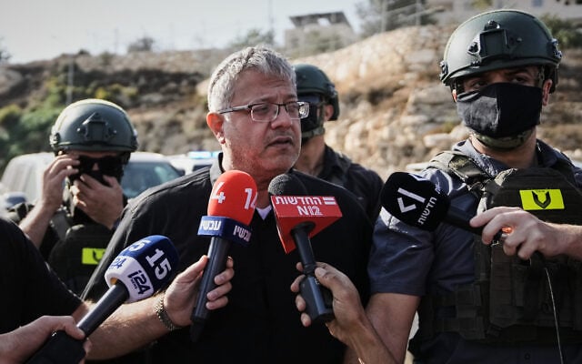 National Security Minister Itamar Ben-Gvir speaks to the media at the scene of a shooting attack carried out by Palestinian gunmen at a junction near Hebron in the West Bank, October 23, 2026. (AP Photo/Mahmoud Illean) National Security Minister Itamar Ben-Gvir speaks to the media at the scene of a shooting attack carried out by Palestinian gunmen at a junction near Hebron in the West Bank, October 23, 2026. (AP Photo/Mahmoud Illean)